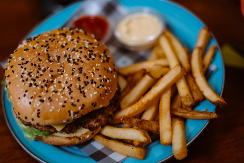 A close-up of a delicious burger and fries from an affordable eatery. — cheap eats Las Vegas