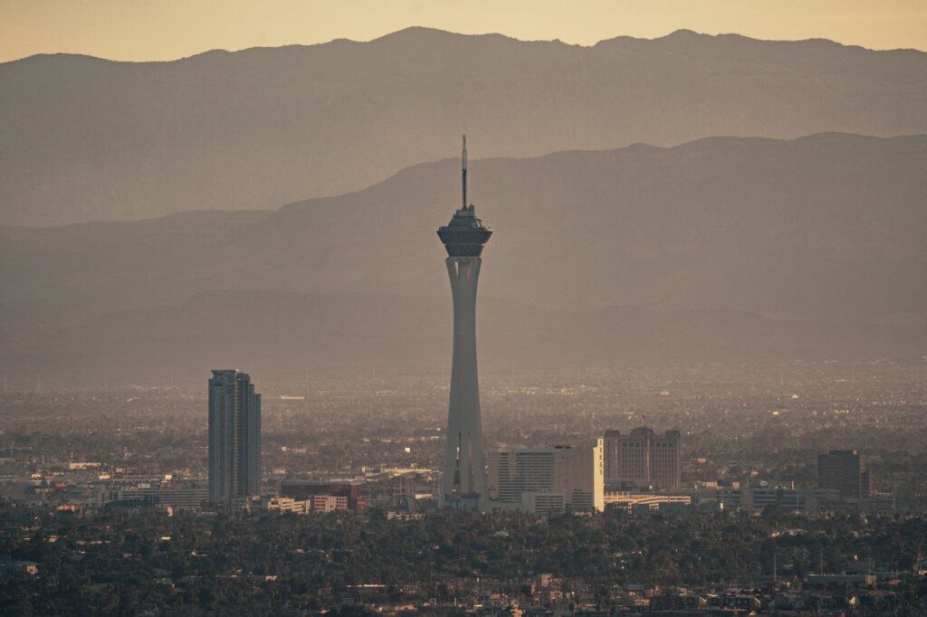 A couple enjoying a helicopter tour over the Las Vegas Strip. — romantic getaway Las Vegas