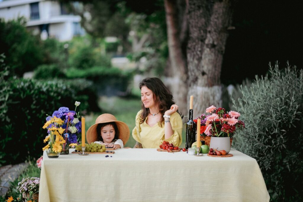 A family enjoying a picnic at Springs Preserve with vibrant flowers. — outdoor activities in Las Vegas