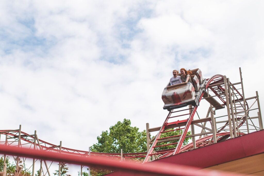 A family enjoying a thrilling roller coaster ride at a Las Vegas amusement park. — family activities Las Vegas