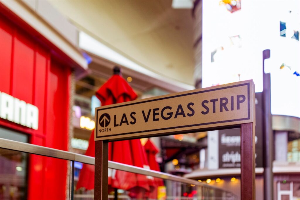 A family taking a selfie outside one of the popular Las Vegas shows. — family shows in Las Vegas