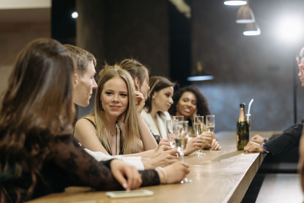 A group of friends enjoying a night out in one of the top bars, capturing the essence of Vegas nightlife. — Vegas nightl…