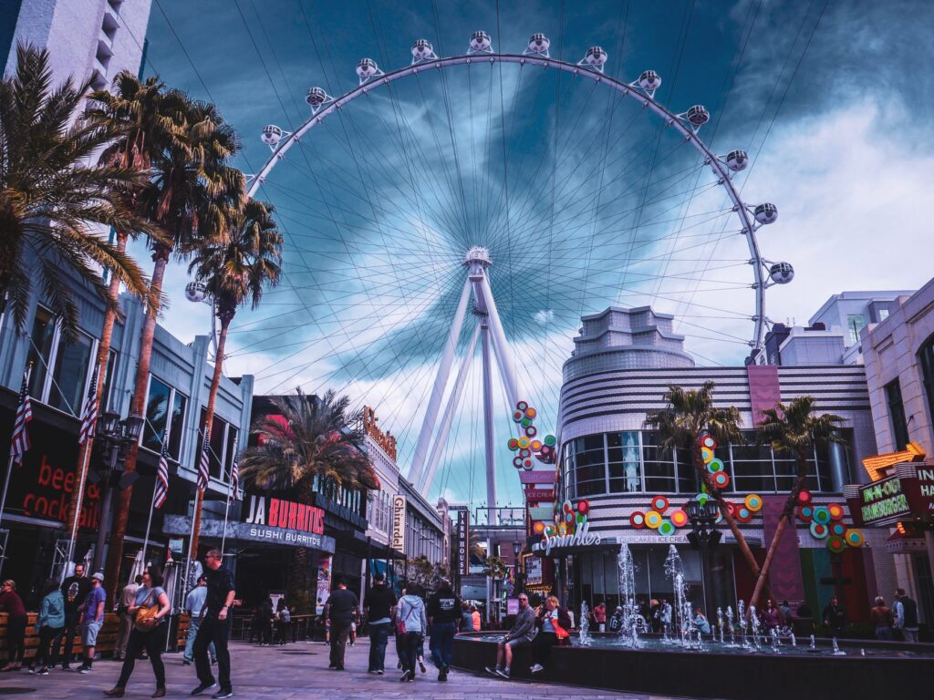 A lively Las Vegas scene showcasing tourists enjoying their stay — Las Vegas hotel deals