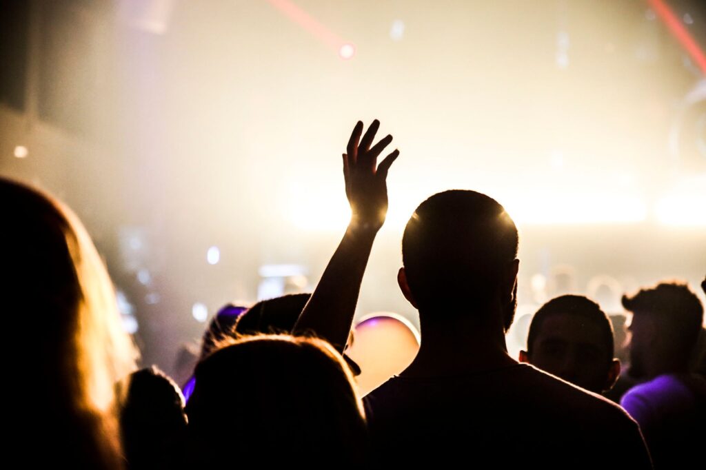A lively dance floor in a popular Vegas club, with a DJ and crowd dancing. — Las Vegas nightlife
