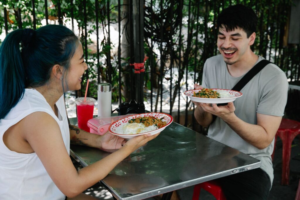 A person enjoying a meal at a famous cheap eats spot in Las Vegas. — budget dining in Las Vegas