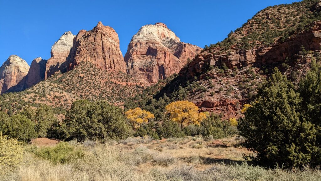 A picturesque fall landscape of Red Rock Canyon with colorful foliage. — unique attractions Las Vegas