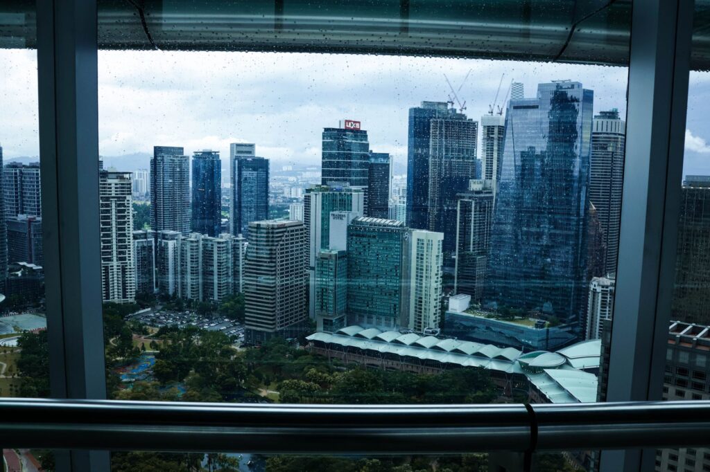 A scenic view from a hotel room balcony overlooking the city skyline. — weekend getaway Las Vegas