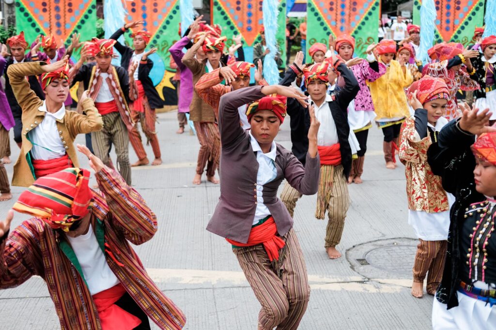 A snapshot of a community festival with colorful booths and attendees participating in free activities. — free events La…