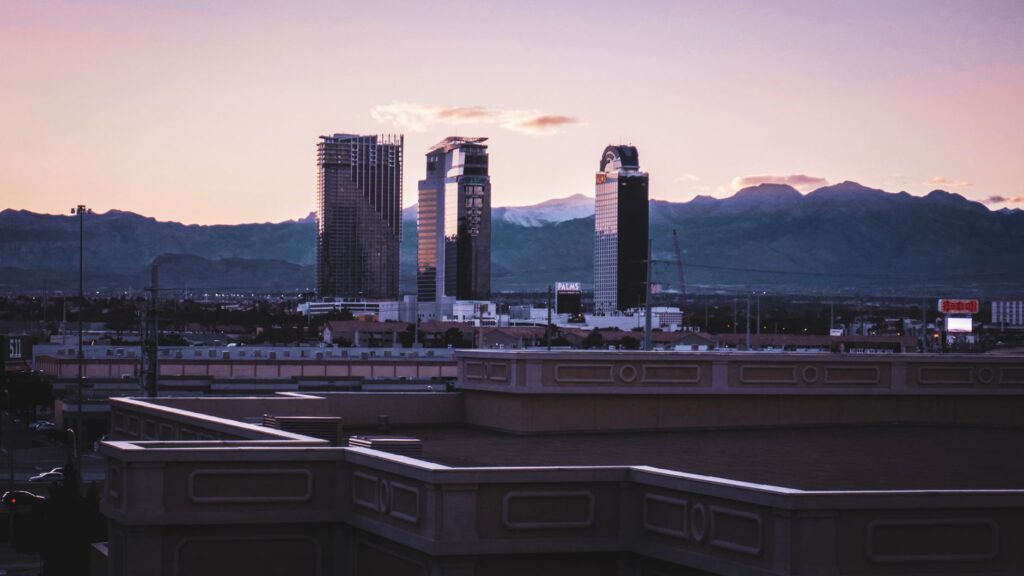 A sunset view from a hiking trail with the Las Vegas skyline in the background. — outdoor activities in Las Vegas