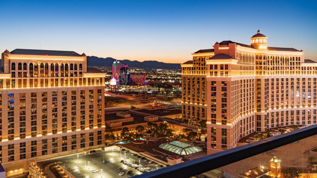 A vibrant exterior shot of a budget hotel in Las Vegas, showcasing its neon lights. — budget hotels in Las Vegas