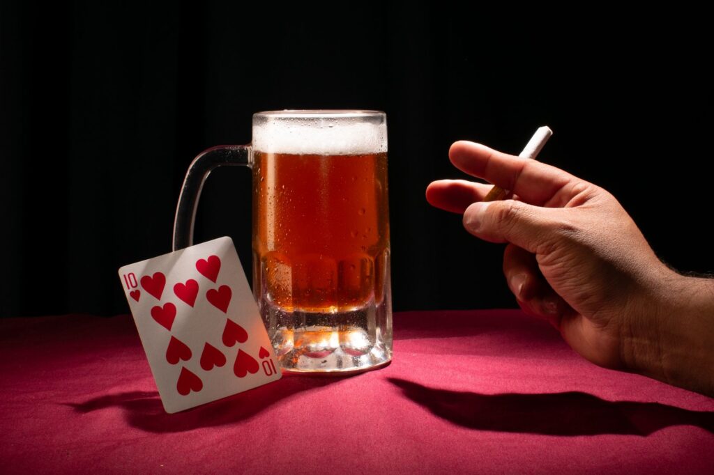 A vibrant shot of a casino bar with patrons enjoying free drinks while gambling. — free drinks gambling Vegas