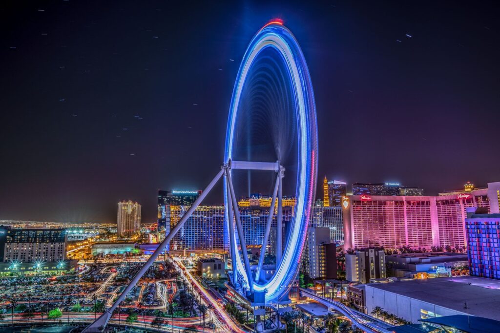 Aerial view of the High Roller Observation Wheel against the backdrop of Las Vegas. — Las Vegas attractions