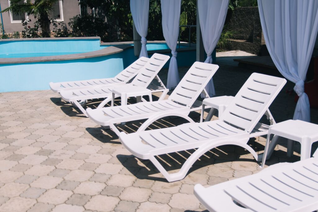 An image of sun loungers and cabanas at a popular pool party venue, highlighting relaxation options. — Las Vegas pool pa…