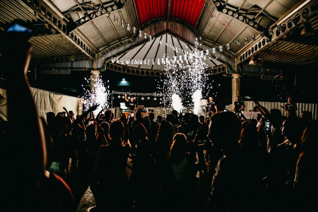 An upscale nightclub with a DJ performing to an energetic audience — Las Vegas nightlife guide