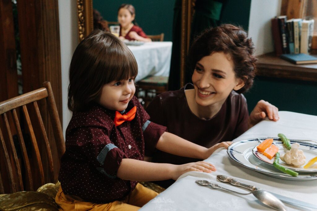 Families dining together at a themed restaurant, such as a medieval dinner show. — family activities Las Vegas
