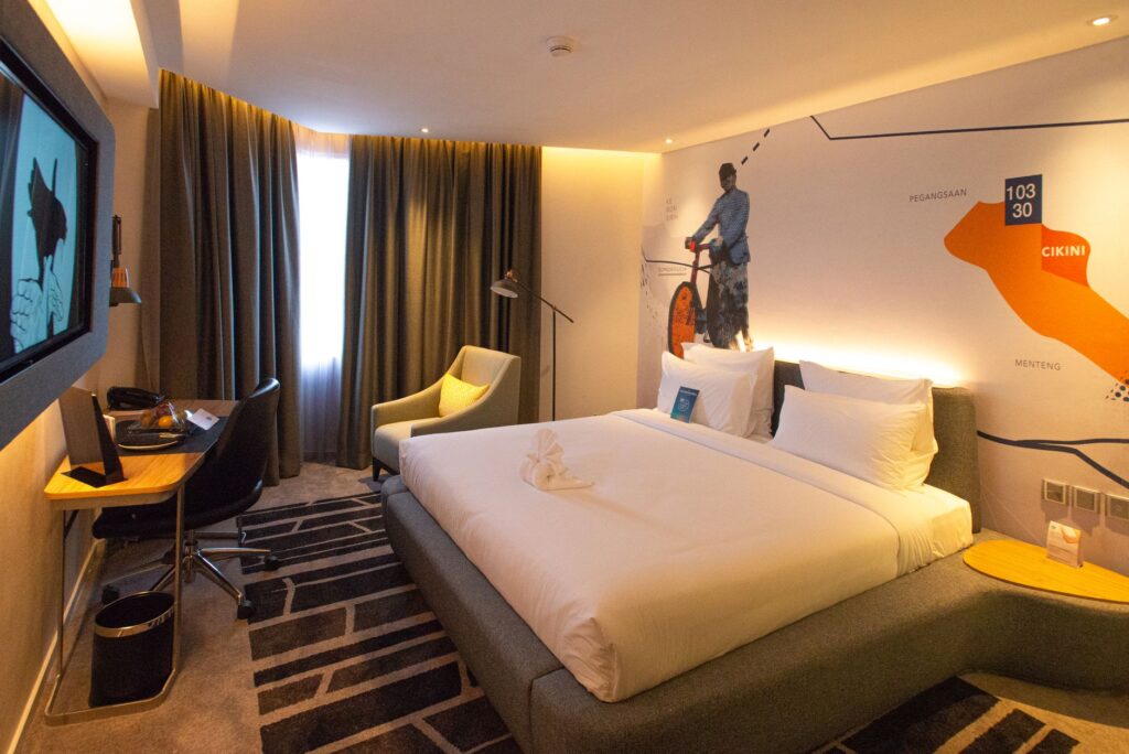 Interior of The LINQ Hotel room, highlighting its modern amenities for budget travelers. — affordable hotels Las Vegas S…
