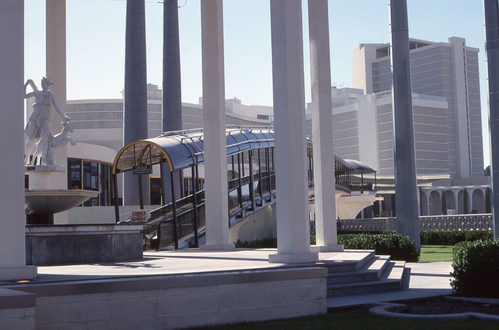 The Las Vegas Monorail station with people waiting. — transportation in Las Vegas