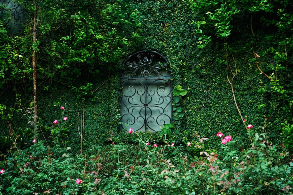 The entrance to The Secret Garden at the Mirage with lush greenery. — hidden gems in Las Vegas