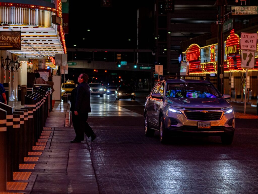 The lively atmosphere of Fremont Street with its LED canopy and street performers. — free attractions Las Vegas