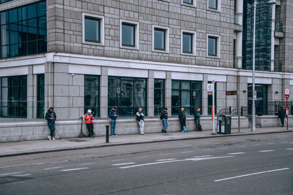 A busy RTC bus stop with travelers waiting, capturing the essence of public transportation in Las Vegas.