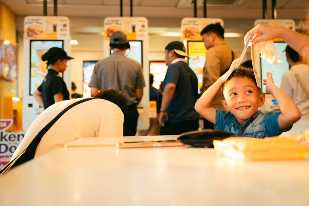 A family dining at a themed restaurant with kids' menus and fun decor. — family-friendly Las Vegas attractions