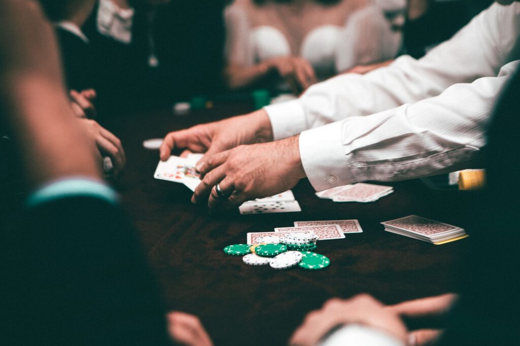 A happy group of friends celebrating a win at a Vegas casino. — winning at Las Vegas casinos