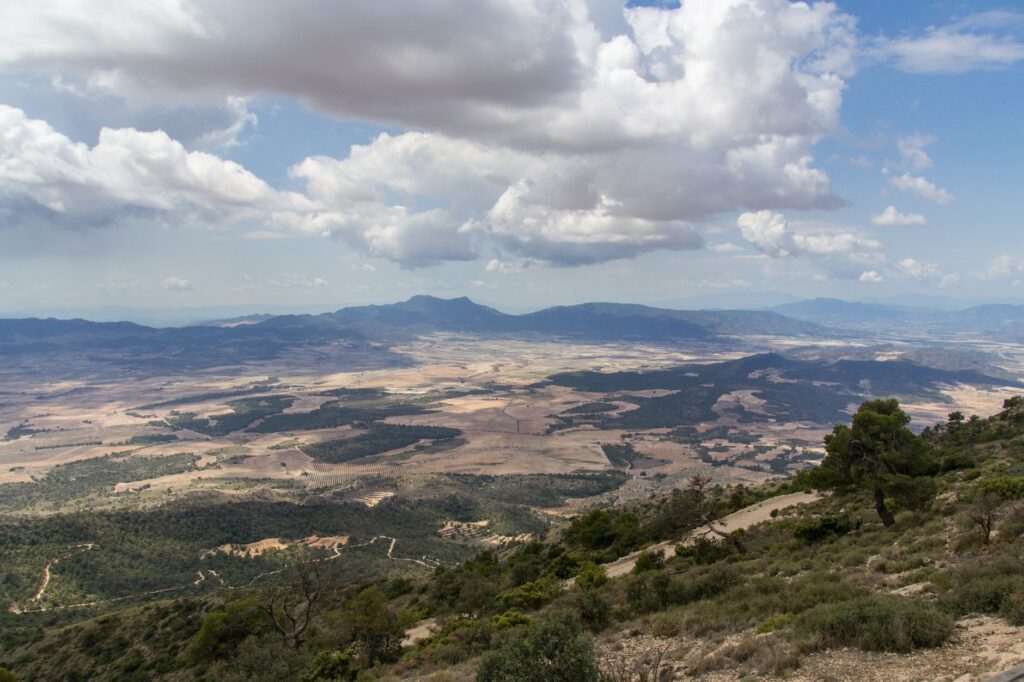 A panoramic view from a mountain summit, highlighting the valley below. — outdoor adventures Las Vegas