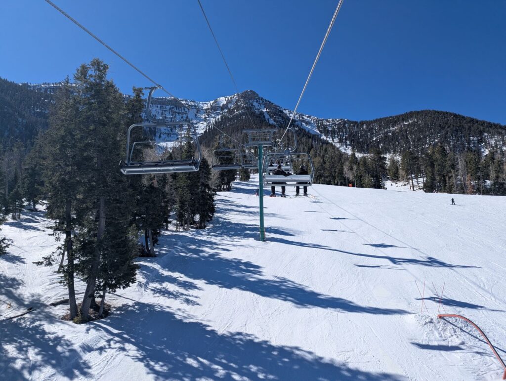 A picturesque view of Mount Charleston, covered in snow during winter. — day trips from Las Vegas