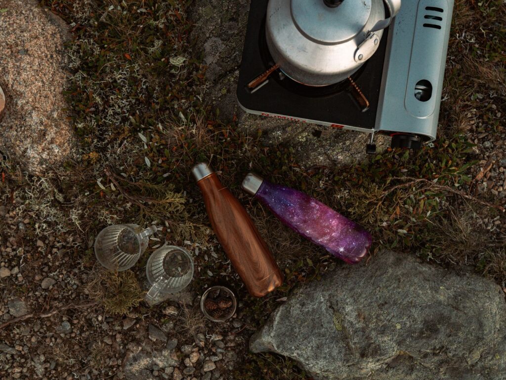 A reusable water bottle and healthy snacks packed for the trip. — packing list for Las Vegas