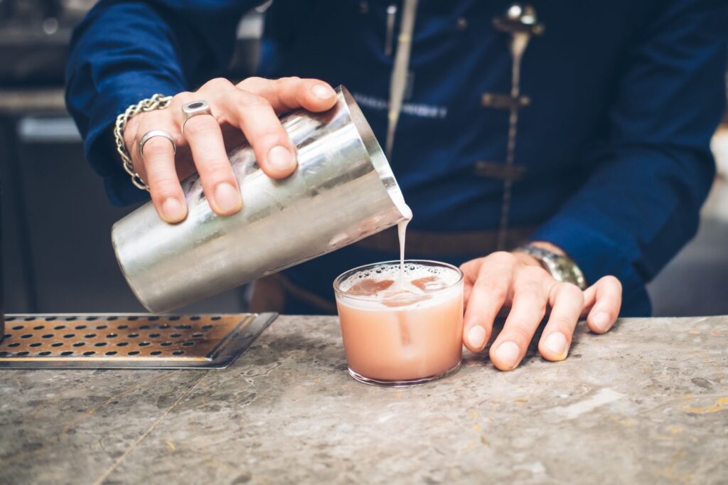A stylish cocktail being served at a trendy Las Vegas bar, highlighting the unique drinks available. — Las Vegas nightli…