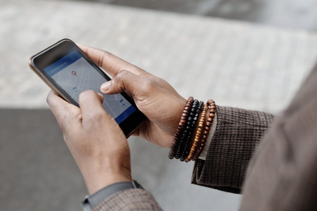 A traveler using a smartphone app to search for hotel deals in Las Vegas. — Las Vegas hotel deals