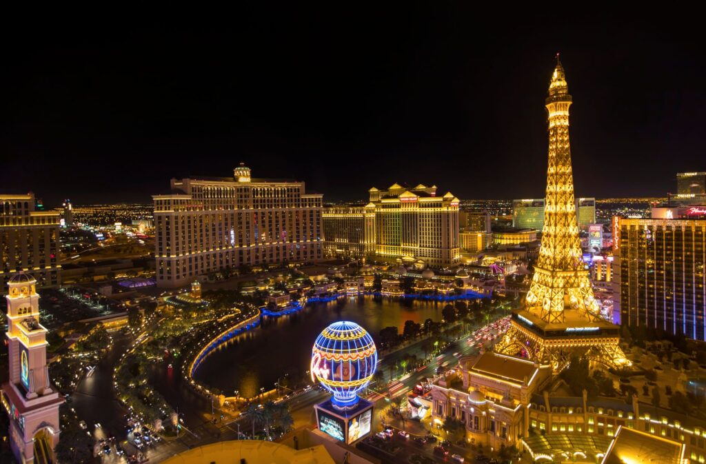An aerial shot of the Las Vegas Strip showcasing illuminated nightclubs. — Las Vegas nightclubs guide