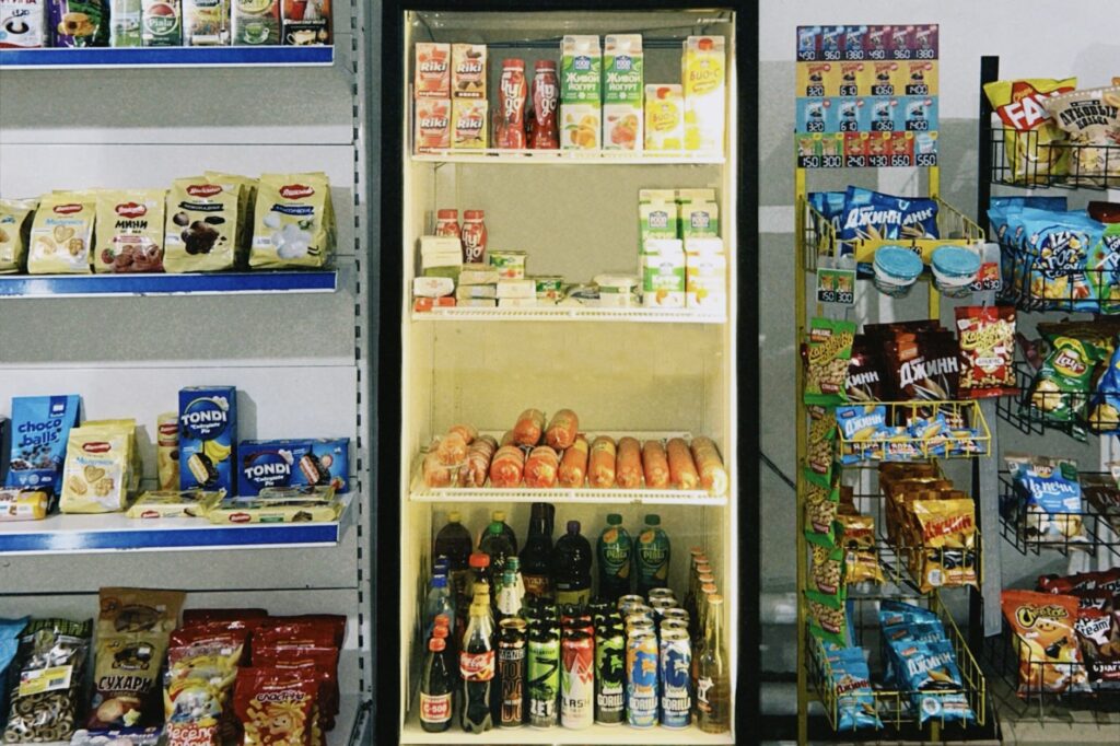 An assortment of snacks and a reusable water bottle, essential items from your packing list for Las Vegas.