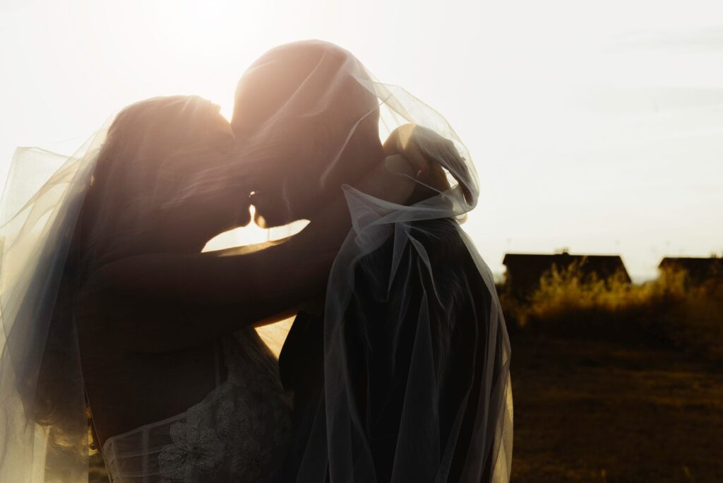 Couples sharing a romantic moment at a scenic outdoor Las Vegas elopement. — Las Vegas wedding planning