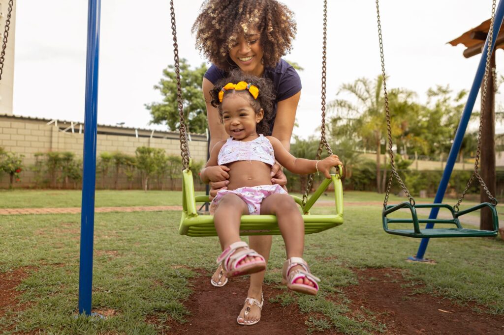 Families enjoying a day at a park in Las Vegas, with kids playing on the playground. — family activities in Las Vegas